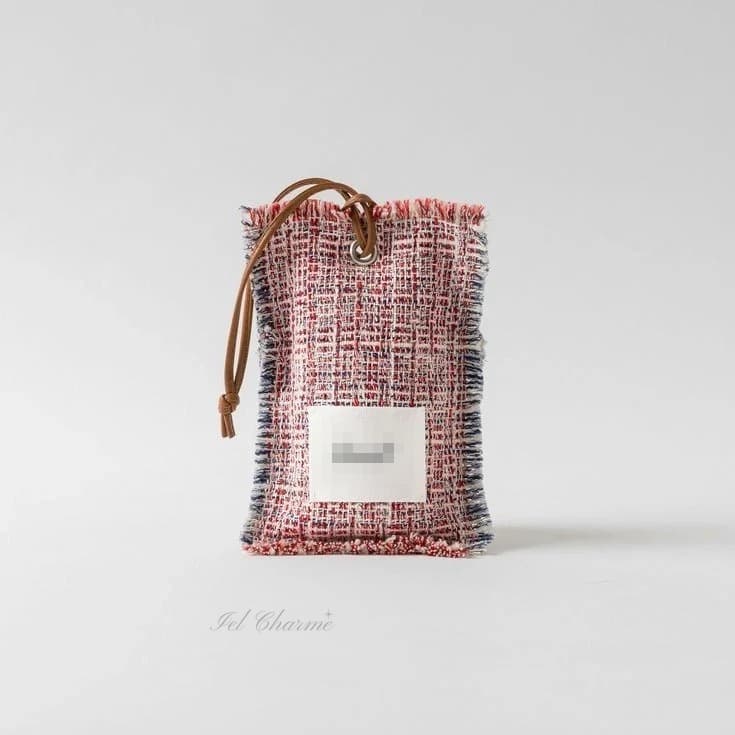 Pochette en tweed teint en fil
